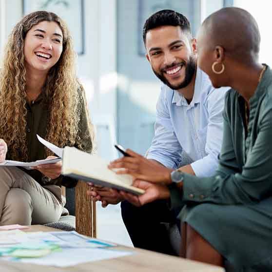 Group of coworkers smiling in office